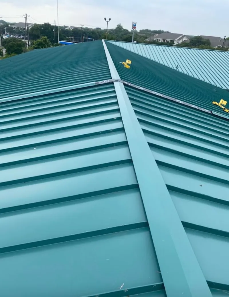 Green commercial metal roof ridge and valley for Metal Roof Repair in Rodeo